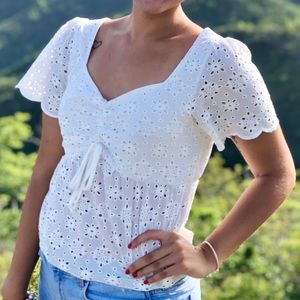 Beautiful, white and detailed women’s shirt